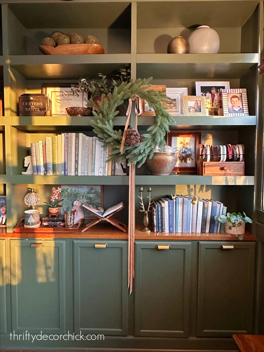 built in bookcase with wreath